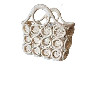 Handcrafted Wheel shaped raffia beach tote basket color cream